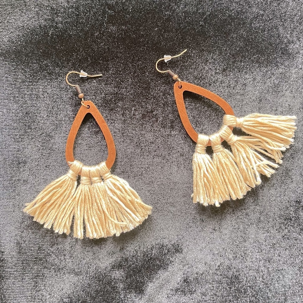 Boho style cream fringe on brown wooden teardrop ring